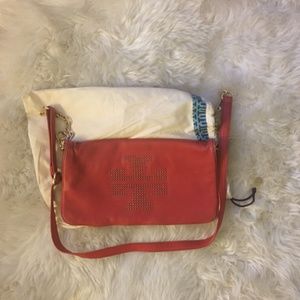 cross body purse with large TB logo in a gold tone